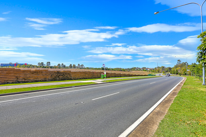 Vivid Productions Commercial Photography and Videography Vacant Land - Road View of the Wall